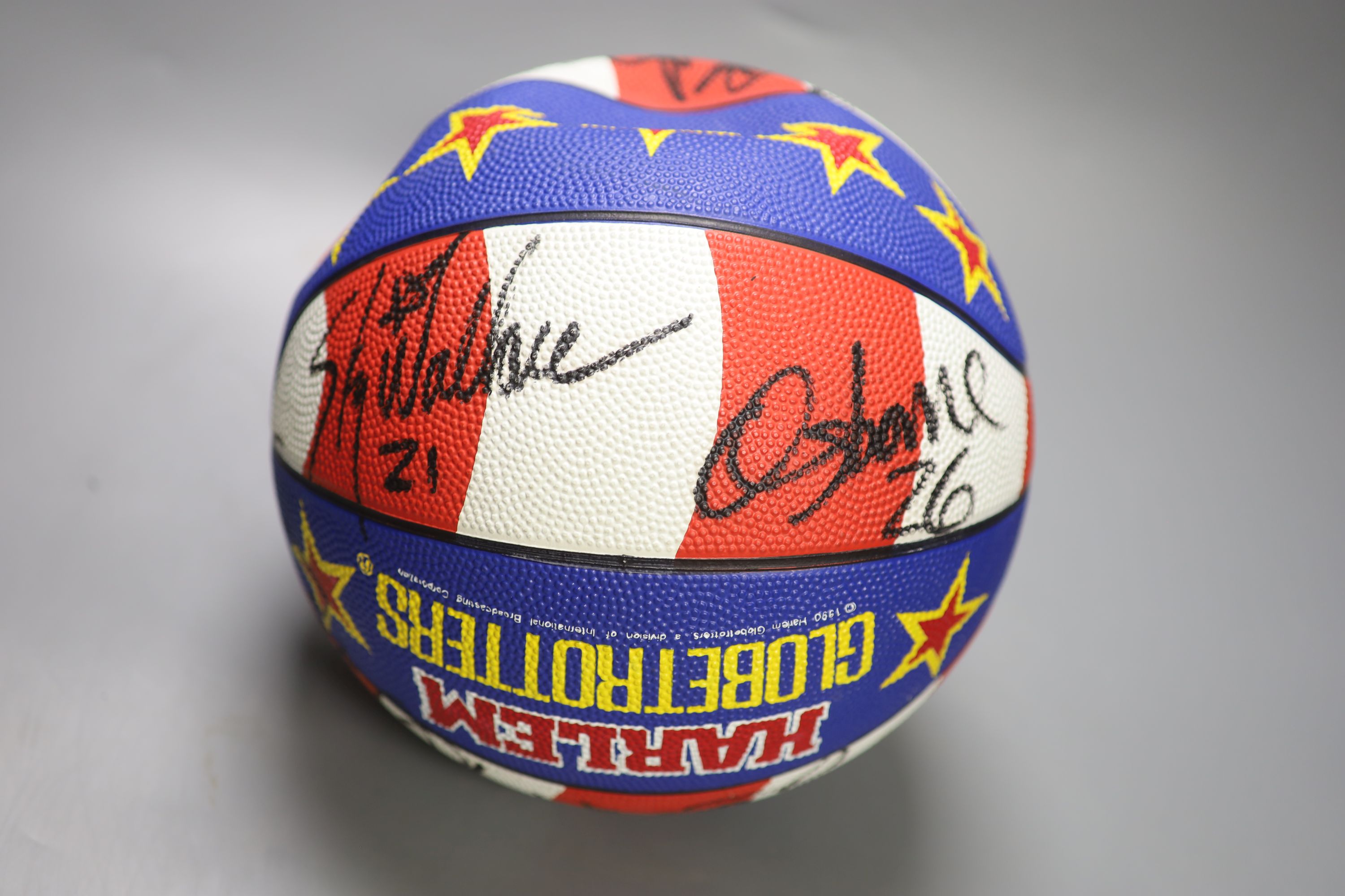 A Harlem Globe Trotters signed basketball